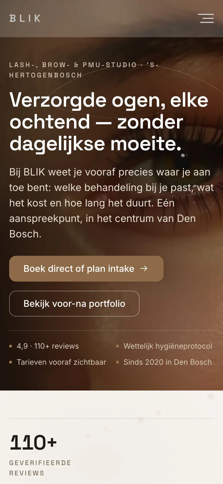 De homepage van BLIK op 19 juli op een telefoon: donkere kop met een gedimd oog en een schreefloze letter