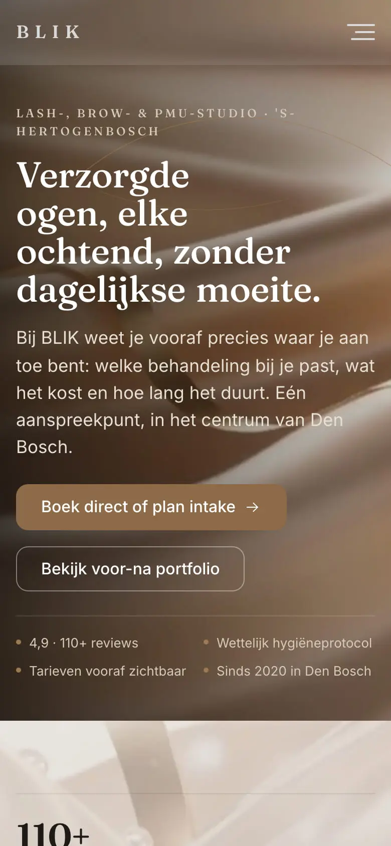 De homepage van BLIK later op 21 juli: crèmekleurige zijde met een gouden lint achter de kop